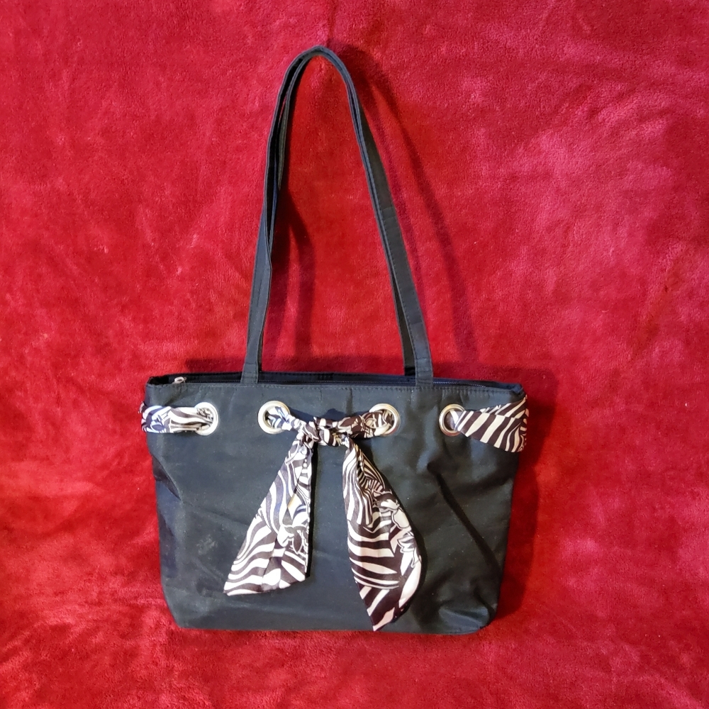 Black Purse Zebra Print Bow With Purple Lining Inside